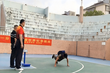 Most Push-Ups (Finger Tips, One Leg Raised, Carrying 20 lb Pack) in One Minute